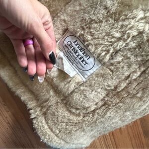 fur jackets brown / creamy size medium/ large brand is Jonathan Christopher
